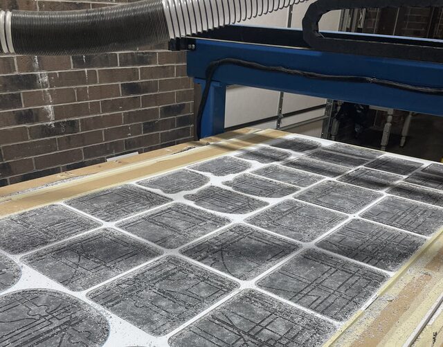 Commercial routing equipment cutting printed material