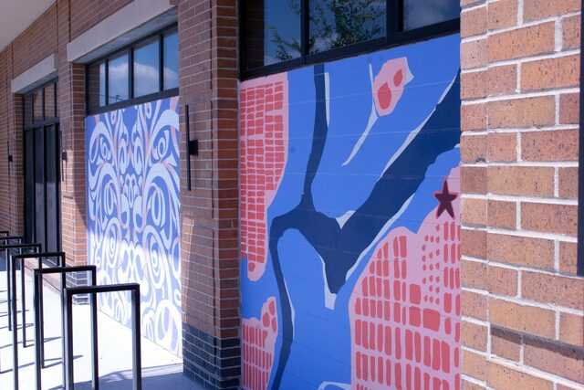 Specialty film graphics installed across a commercial building exterior